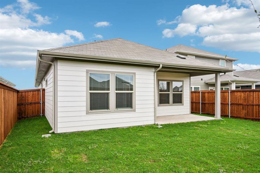 Exterior details and patio area of a home in Lakehaven - Spring Series, Farmersville (Image 22).