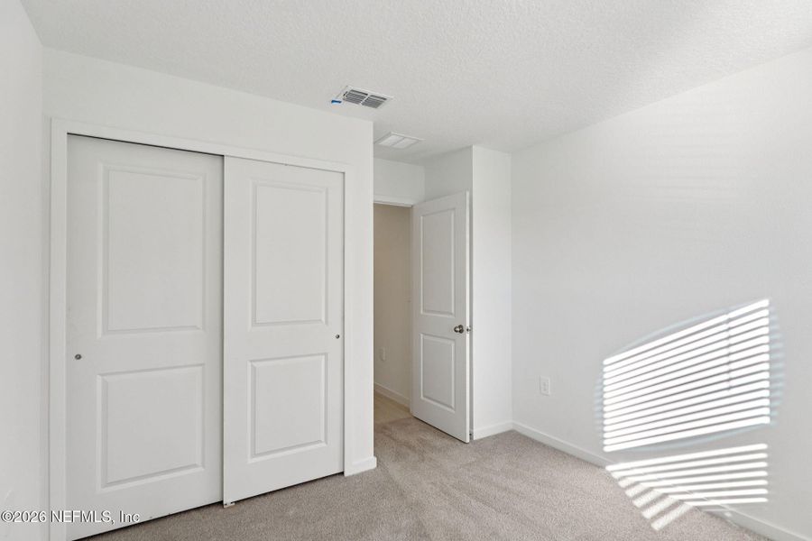 Spacious, unfurnished interior of a new home in Flagler Village - Signature Series, Palm Coast (Image 14).