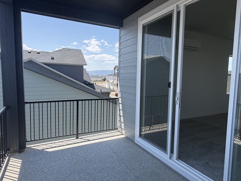 Exterior details and patio area of a home in Elevate at Wolf Ranch, Colorado Springs (Image 4).