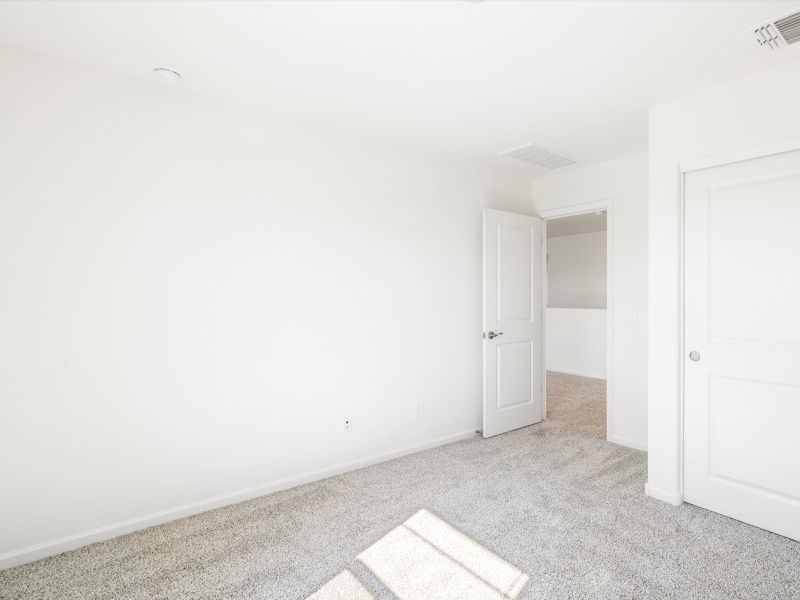 Spacious, unfurnished interior of a new home in Mandarina - Signature Series, Marana (Image 14).
