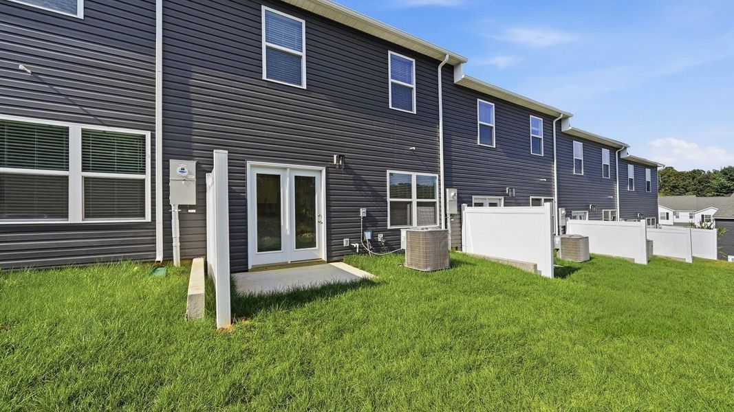 Exterior details and patio area of a home in The Arbor Townhomes, Kingsport (Image 3). Exterior details and patio area of a home in The Arbor Townhomes, Kingsport (Image 3).