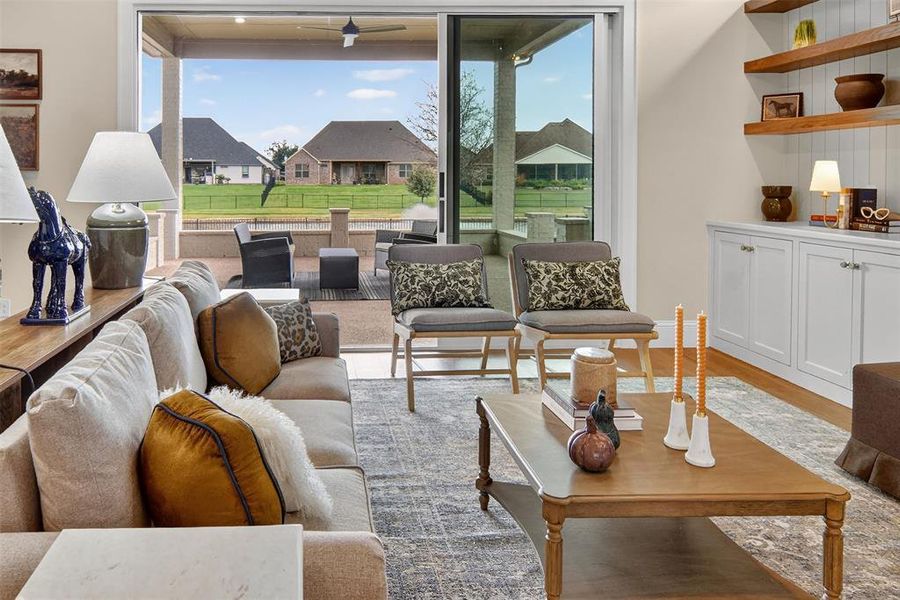 Living room featuring wood finished floors and baseboards