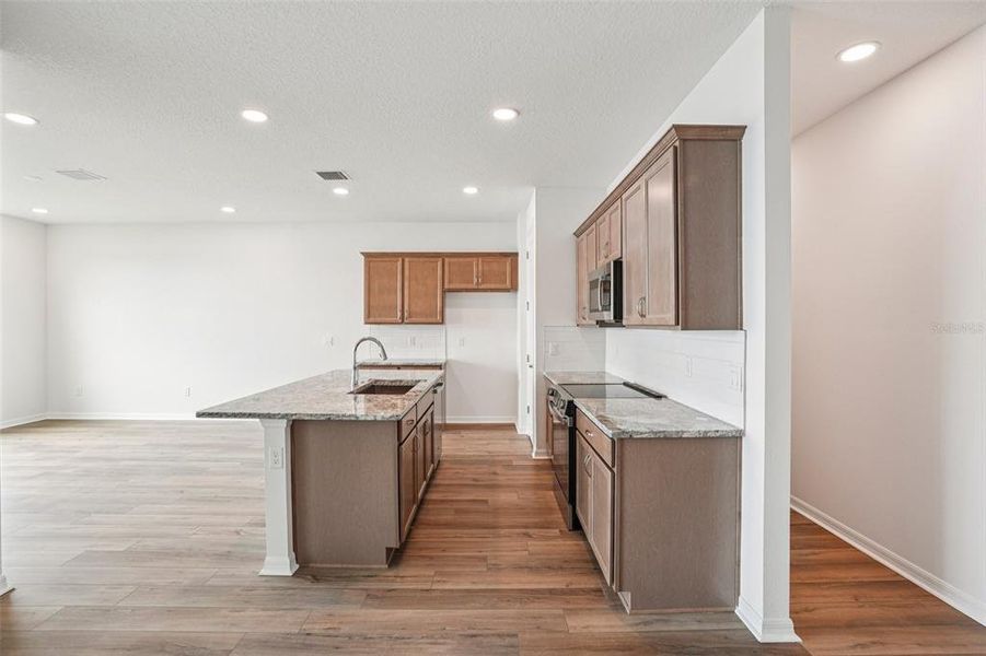Furnished interior view inside a new home in Isla Mirada, San Antonio (Image 7).