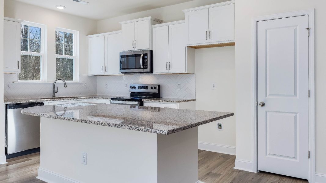 Furnished interior view inside a new home in Battle Bridge, Raleigh (Image 5).