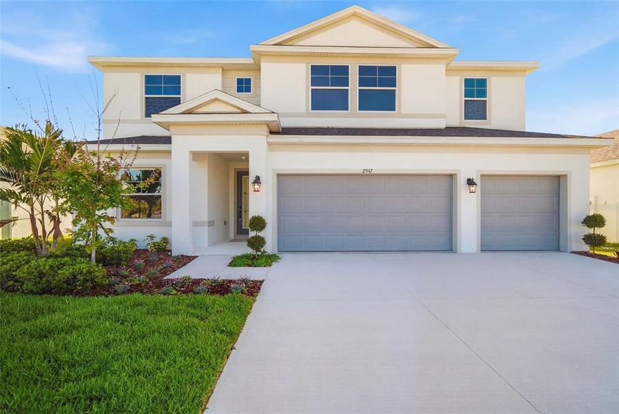 Front exterior of a new home in Fieldstone, Plant City, FL, highlighting curb appeal (Image 29).