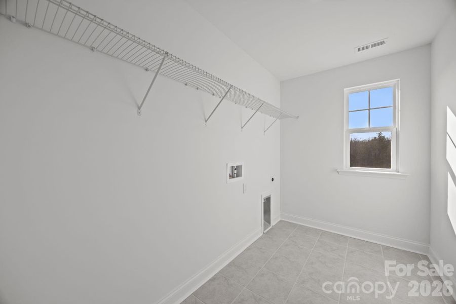 Laundry RoomPhotos are representative and may not reflect the exact home, finishes, or features.