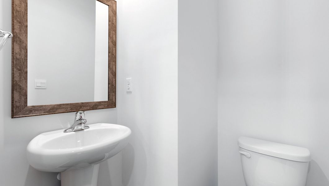 Representative furnished interior of a home built from the BELHAVEN by D.R. Horton in Benjamin's Grove, Woodruff (Image 6).