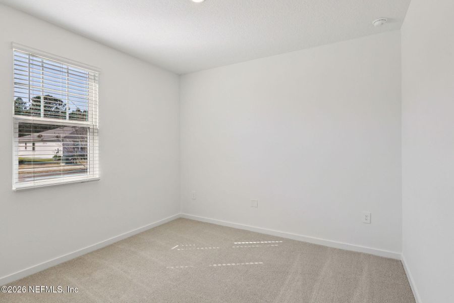 Spacious, unfurnished interior of a new home in Lakes at Bella Lago - Signature Series, Green Cove Springs (Image 30).