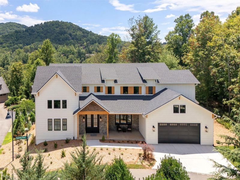 Front exterior of a new home in , Asheville, NC, highlighting curb appeal (Image 26).