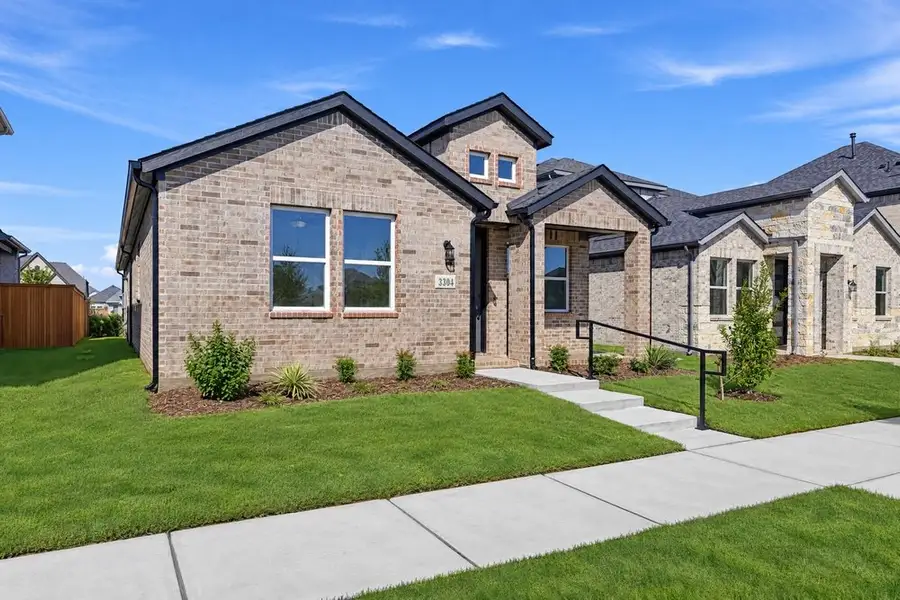 Front exterior of a new home in North Sky Celina, Celina, TX, highlighting curb appeal (Image 19). Front exterior of a new home in North Sky Celina, Celina, TX, highlighting curb appeal (Image 19).