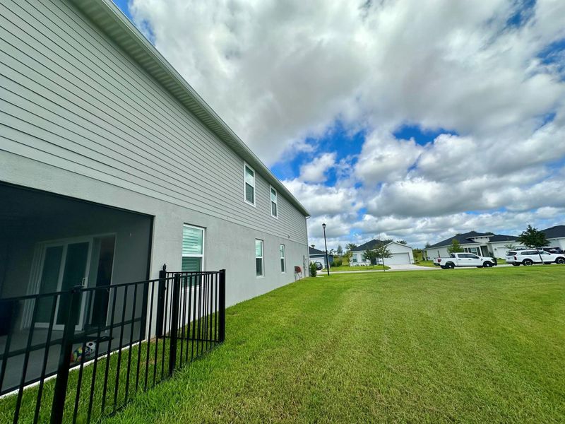 Front exterior of a new home in , Port St. Lucie, FL, highlighting curb appeal (Image 25).