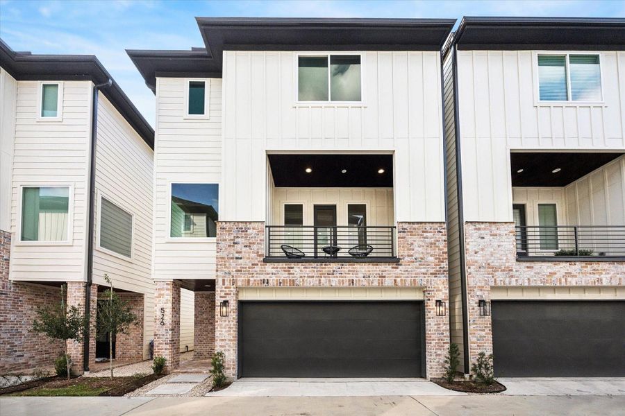 Impressive new construction 3-bedroom, 3.5-bath home meticulously designed to maximize natural light with oversized windows throughout each level.