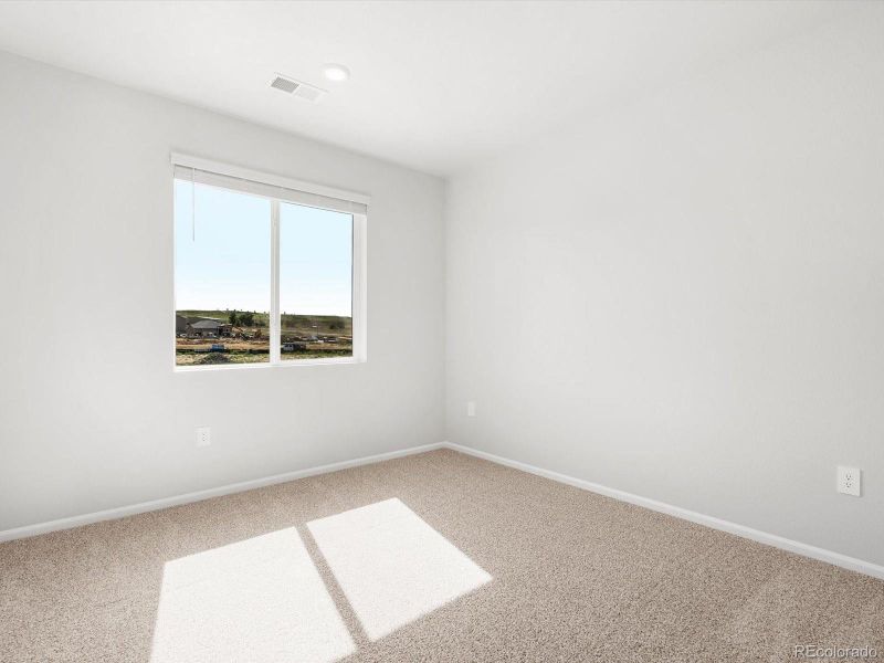 Spacious, unfurnished interior of a new home in Poudre Heights: The Alpine Collection, Windsor (Image 17).