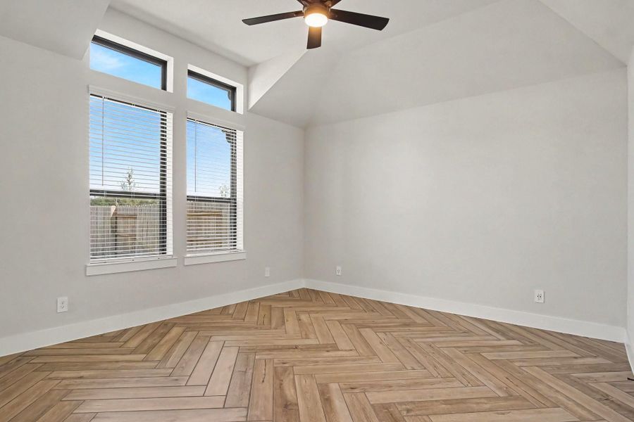 Another view of the primary bedroom. Notice the window blinds and ceiling fan are in place for immediate comfort. Another view of the primary bedroom. Notice the window blinds and ceiling fan are in place for immediate comfort.