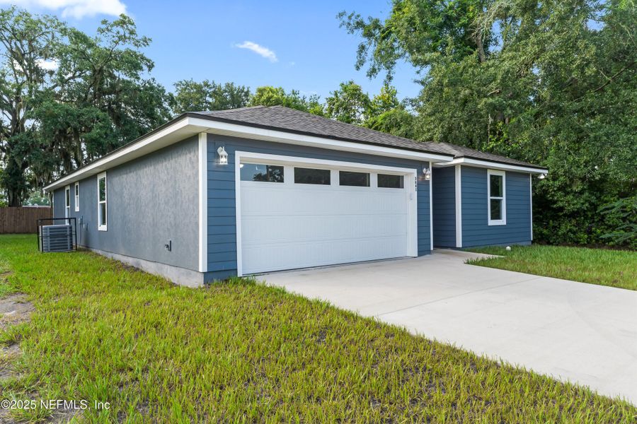 Front exterior of a new home in , Jacksonville, FL, highlighting curb appeal (Image 2). Front exterior of a new home in , Jacksonville, FL, highlighting curb appeal (Image 2).
