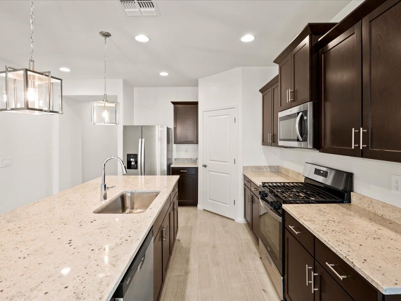 Furnished interior view inside a new home in Mandarina - Premier Series, Marana (Image 3).