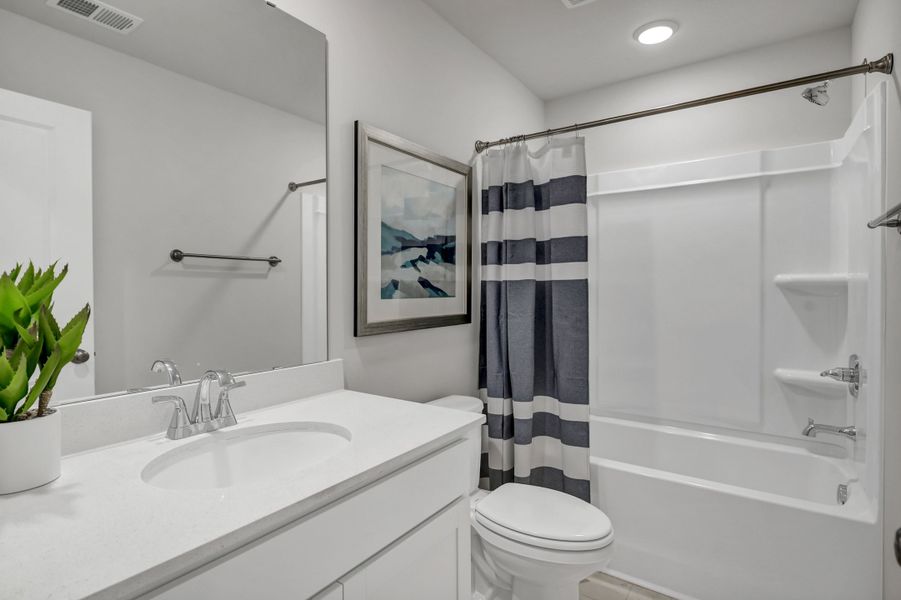 Representative furnished interior of a home built from the Jarrod by Veranda Homes in Trenton Place, Roebuck (Image 35).