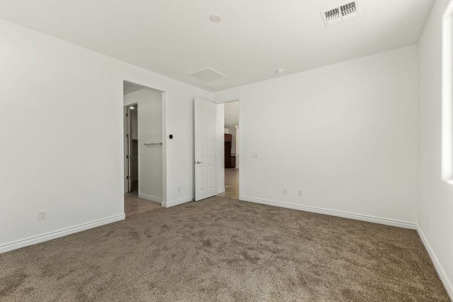 Spacious, unfurnished interior of a new home in Miravida, Surprise (Image 12).