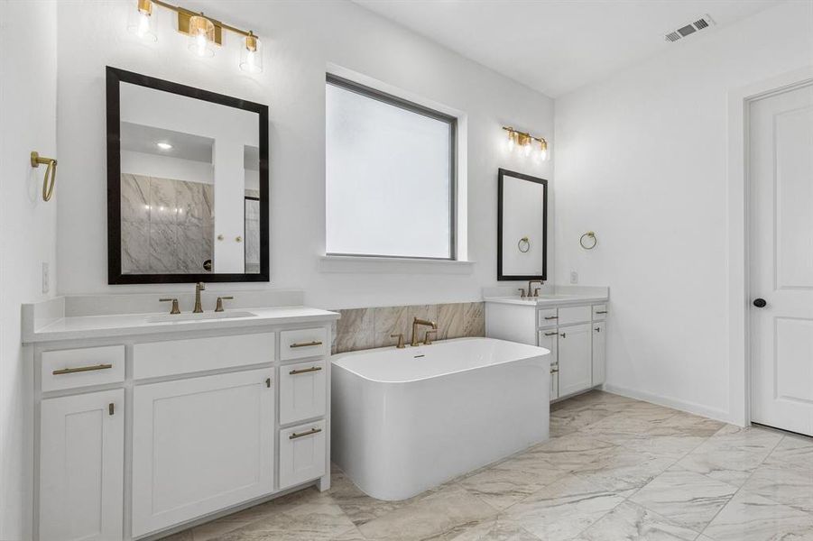 Space and style combine to create this dream owner's bath!