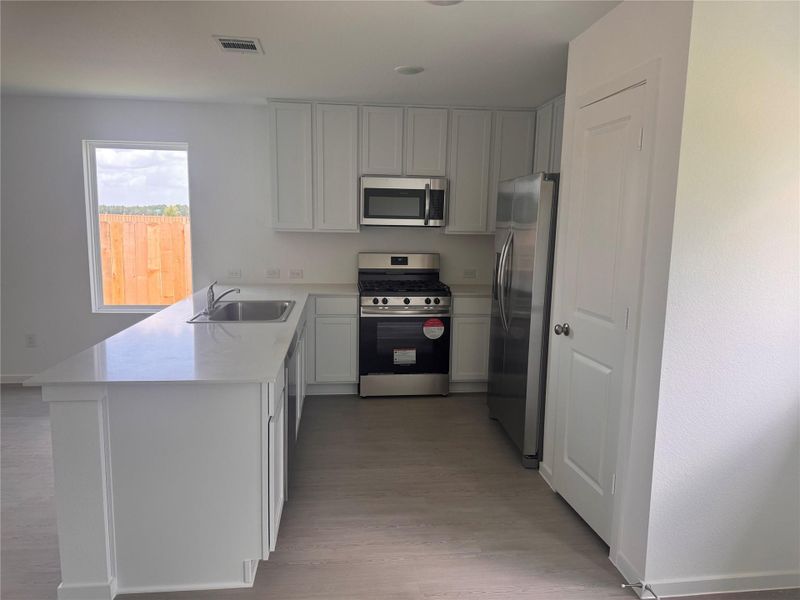 Furnished interior view inside a new home in Pinewood Trails, Cleveland (Image 7).