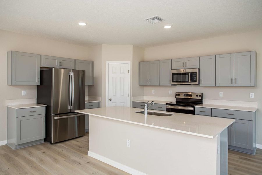 Furnished interior view inside a new home in Villa Mar, Winter Haven (Image 4).