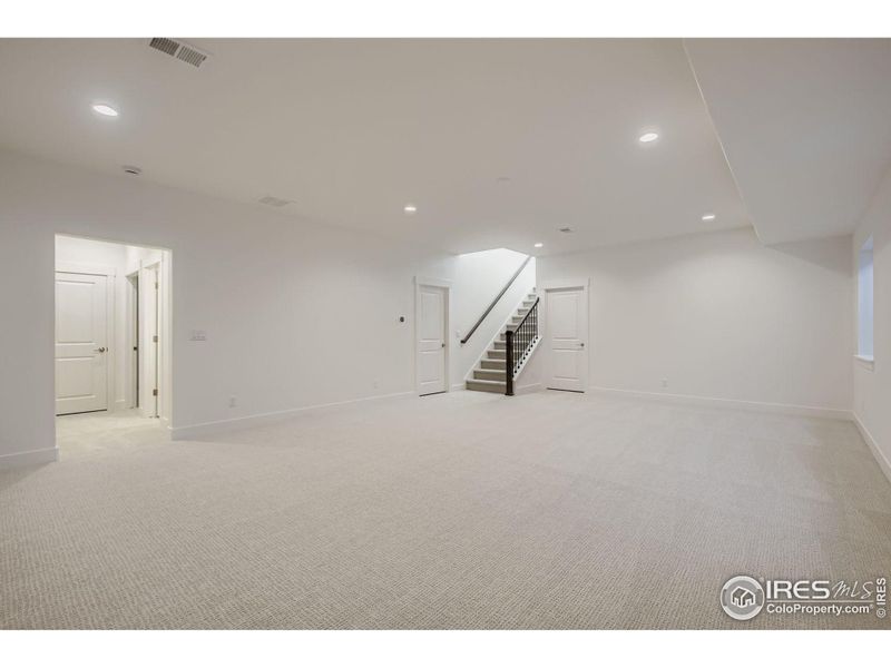 Spacious, unfurnished interior of a new home in RainDance - 60s, Windsor (Image 25).