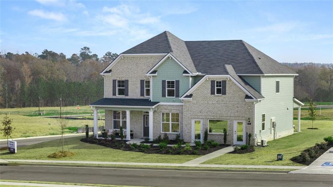 Front exterior of a new home in Evergreen Crossing, Locust Grove, GA, highlighting curb appeal (Image 2). Front exterior of a new home in Evergreen Crossing, Locust Grove, GA, highlighting curb appeal (Image 2).