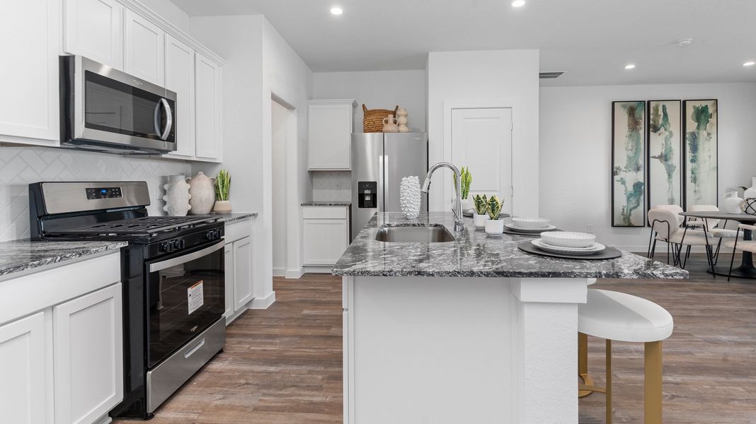 Representative furnished interior of a home built from the BOXWOOD by D.R. Horton in Legacy Village, Houston (Image 5).
