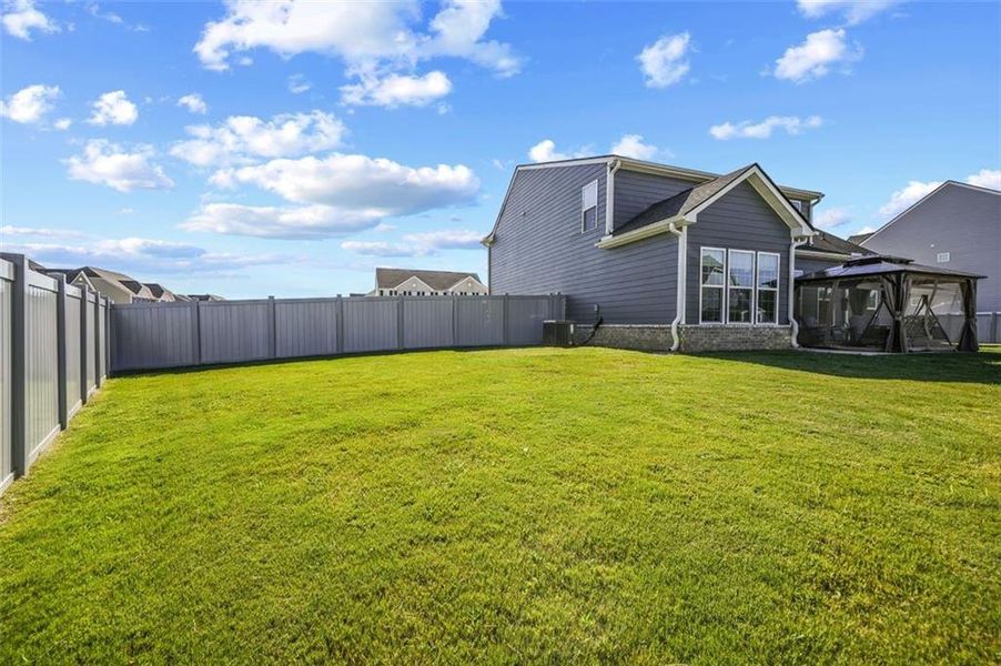 Front exterior of a new home in , Locust Grove, GA, highlighting curb appeal (Image 22).