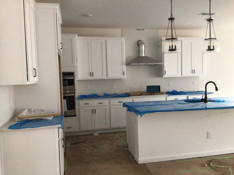 Kitchen featuring the AW Collection® Harmony - Smooth finishes and classic touches shine.