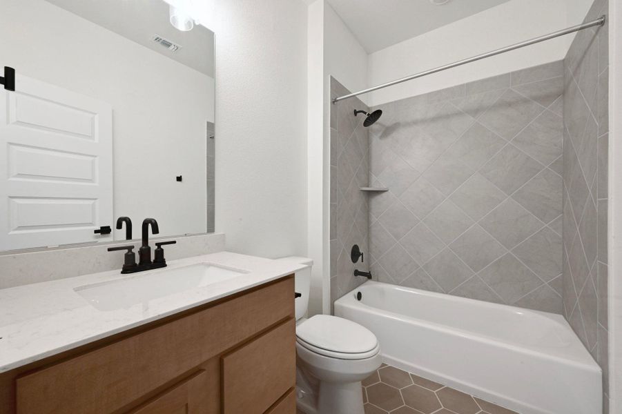 Furnished interior view inside a new home in Salerno - Classic Collection, Round Rock (Image 6).