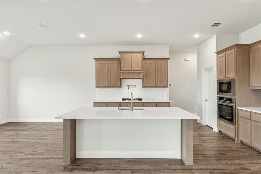 Furnished interior view inside a new home in Stone River Glen 60s, Royse City (Image 9).