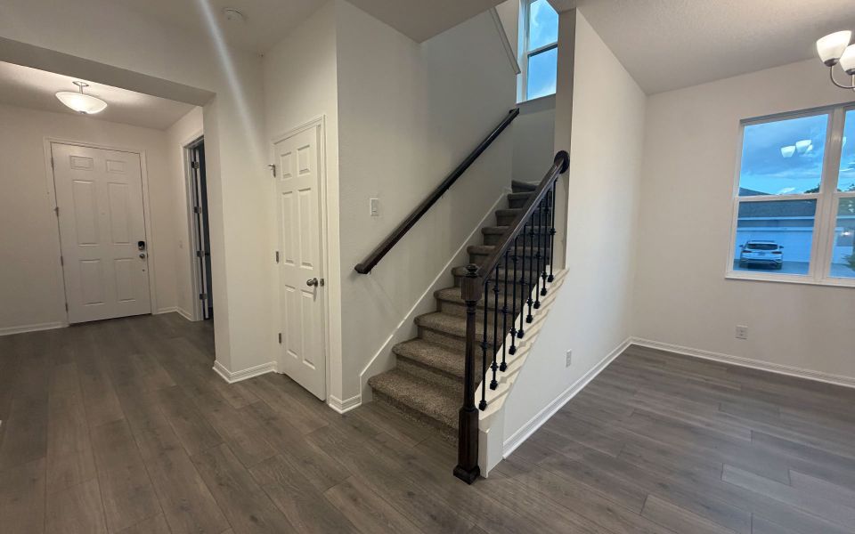 Spacious, unfurnished interior of a new home in Trinity Gardens, Deland (Image 12).