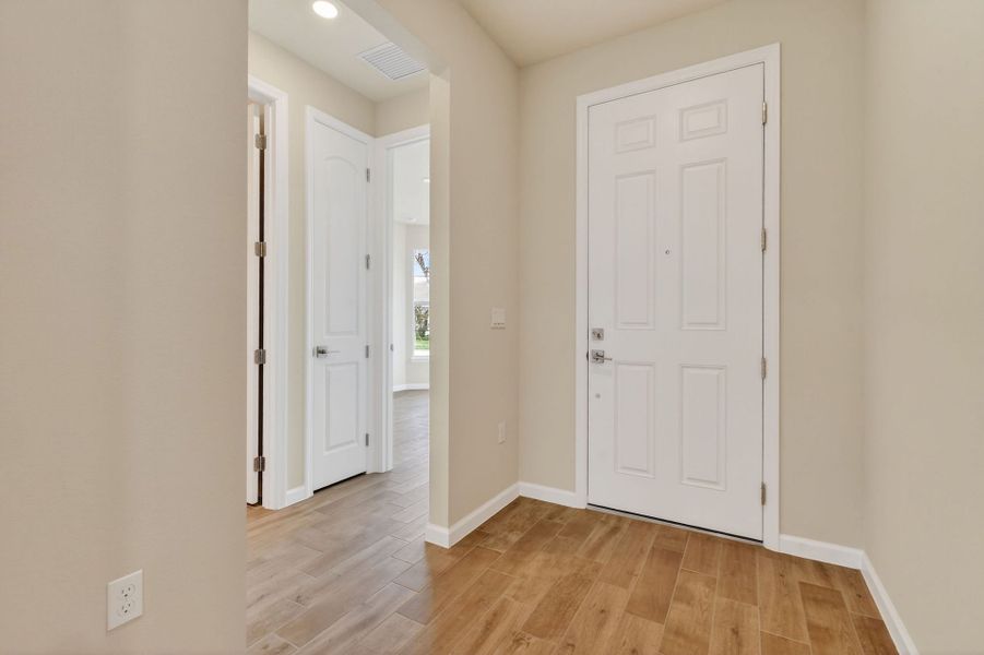 Spacious, unfurnished interior of a new home in Del Webb Tradition, Port St. Lucie (Image 61).