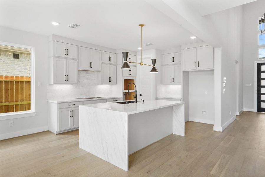 *REPRESENTATIONAL PHOTO* The Stacked Cabinets Showcase the Kitchen with Perfection