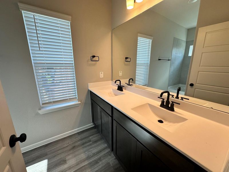 Furnished interior view inside a new home in , Iowa Colony (Image 4).