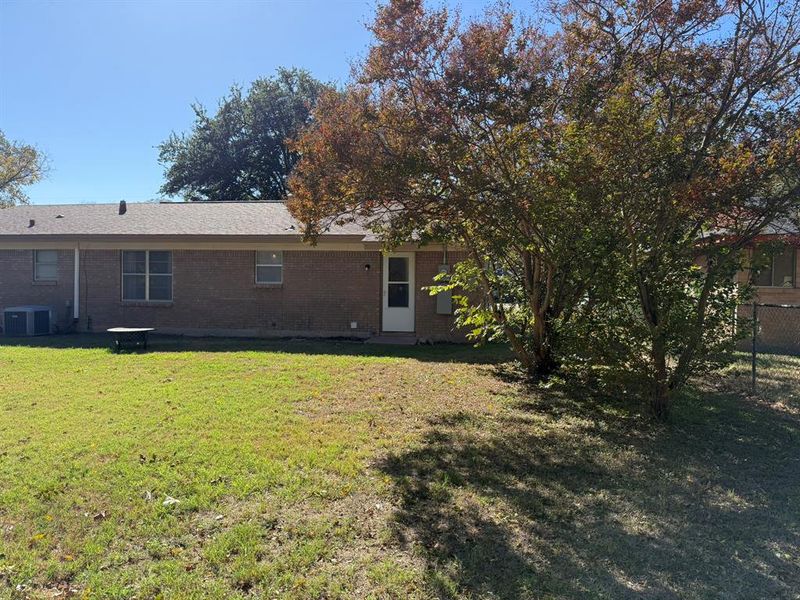 Exterior details and patio area of a home in , Brownwood (Image 3).