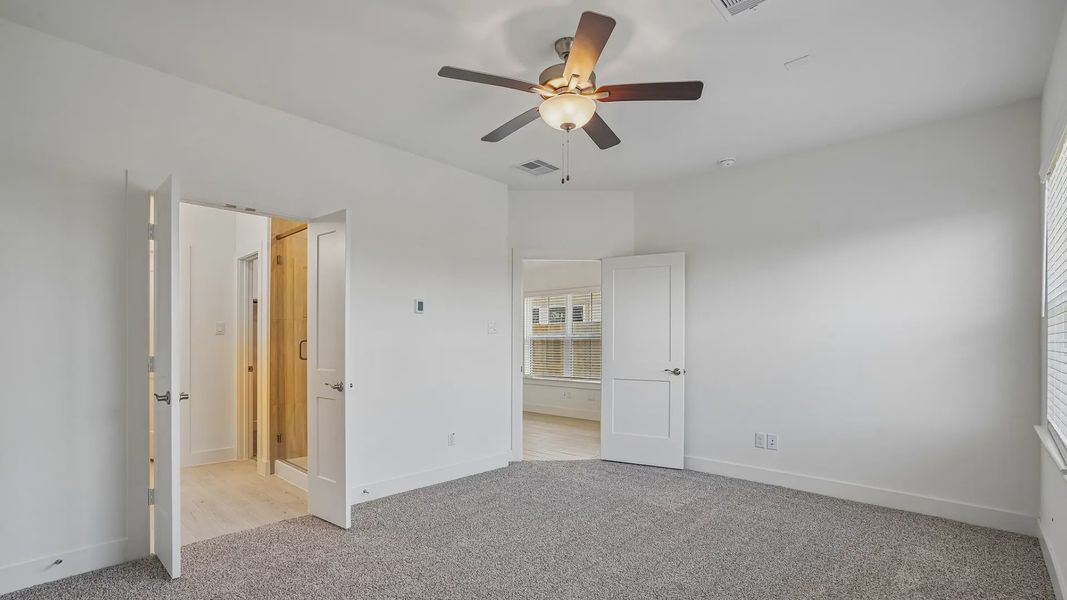 Spacious, unfurnished interior of a new home in Meridiana Townhomes, Iowa Colony (Image 23).