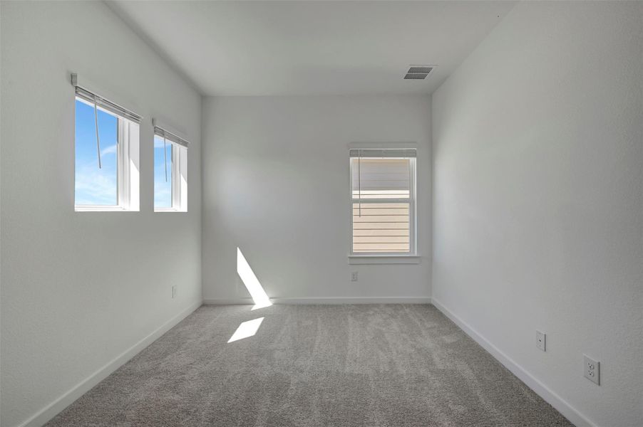 Spacious, unfurnished interior of a new home in Heritage, Dripping Springs (Image 28).
