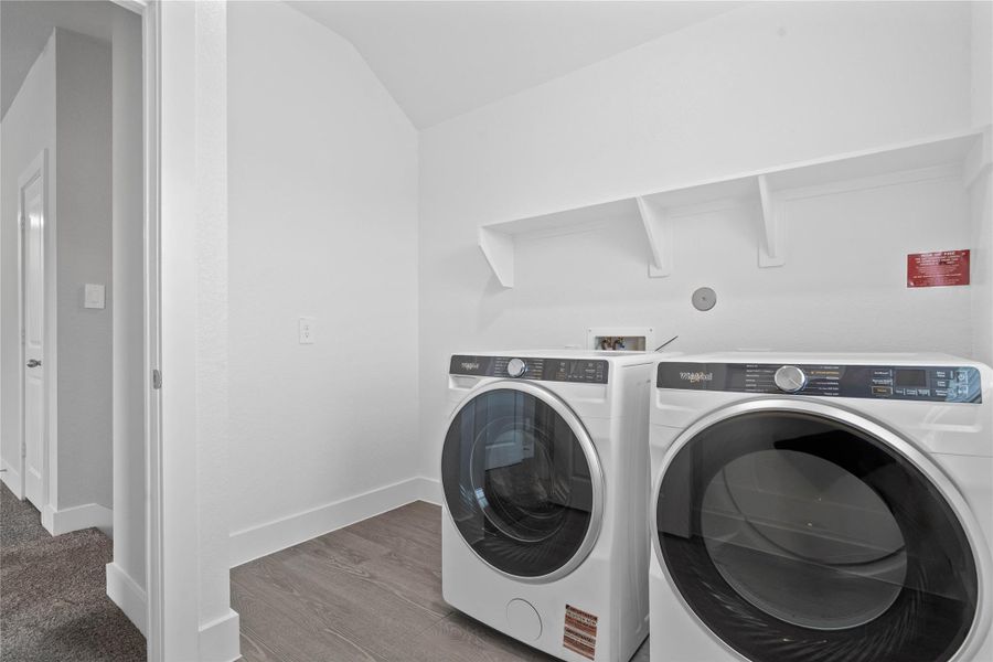 Say goodbye to carrying heavy baskets! This dedicated laundry room is conveniently located on the second floor and comes complete with the included washer and dryer units, ready for immediate use Say goodbye to carrying heavy baskets! This dedicated laundry room is conveniently located on the second floor and comes complete with the included washer and dryer units, ready for immediate use