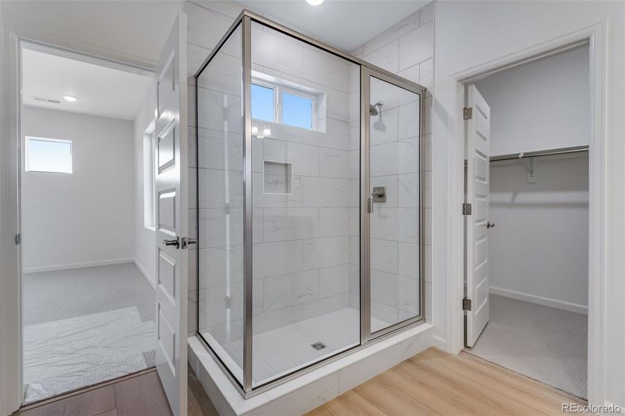 Furnished interior view inside a new home in Crescendo at The Aurora Highlands, Aurora (Image 17).