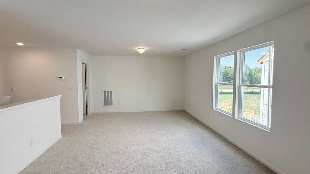 Spacious, unfurnished interior of a new home in Nathans Ridge, Lillington (Image 18).