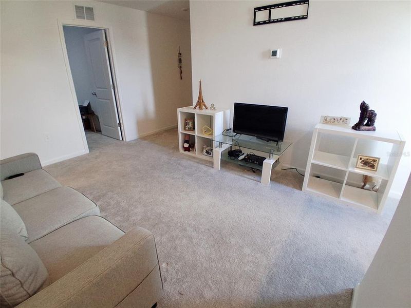 Furnished interior view inside a new home in Hunt Club Groves, Lake Wales (Image 8).