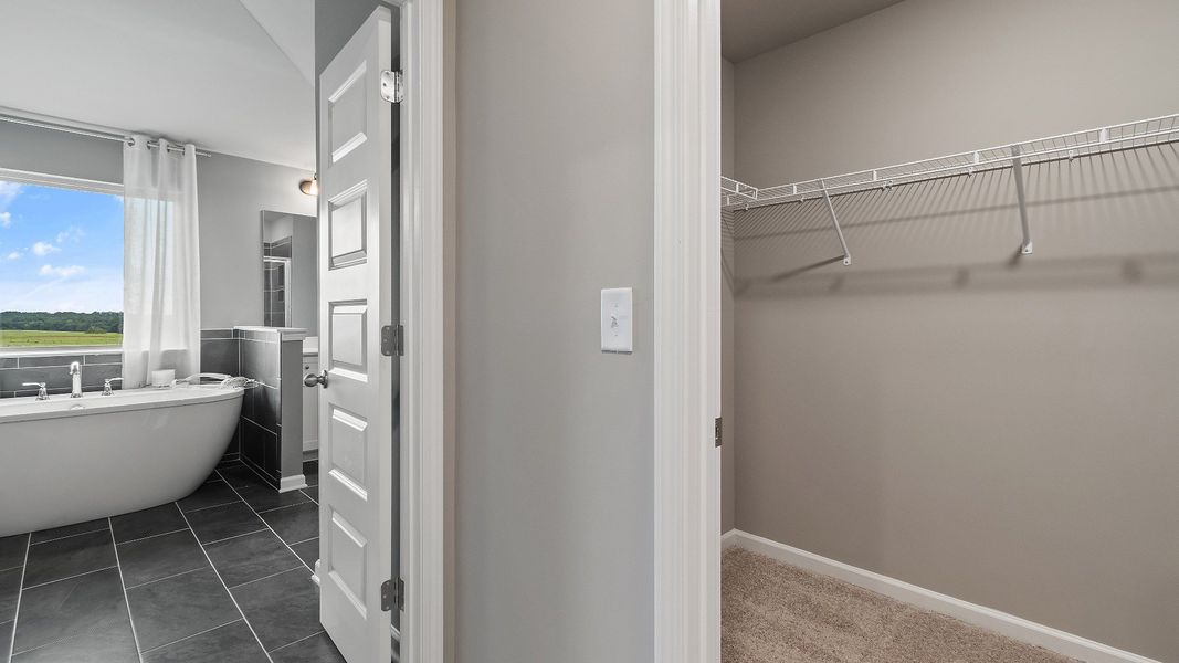 Furnished interior view inside a new home in Cambria at Traditions, Hampton (Image 32).
