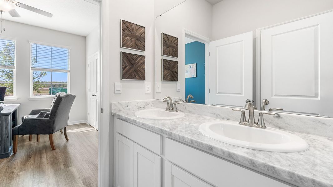 Representative furnished interior of a home built from the Camden by D.R. Horton in Bella Lago, Parrish (Image 19).