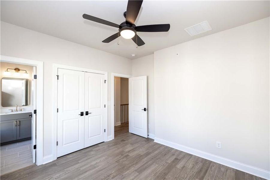 Upstirs secondary bathroom comes with upgraded tops, mirror and combo tub shower *Image is of previously built home* Upstirs secondary bathroom comes with upgraded tops, mirror and combo tub shower *Image is of previously built home*