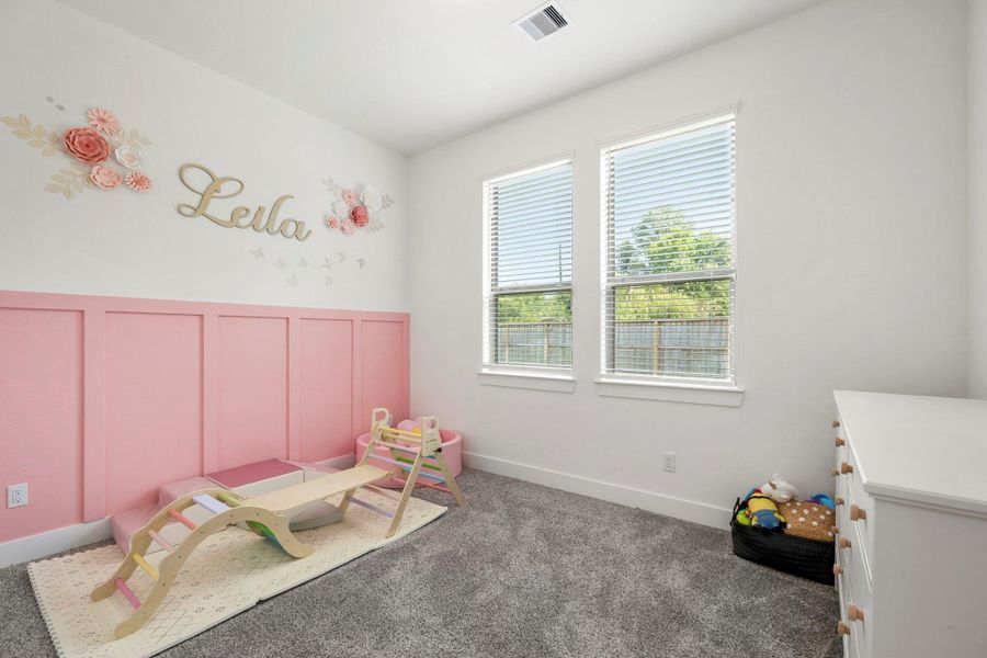 Bright, airy, and effortlessly inviting! This secondary bedroom features warm plush carpet, an accent wall, bright natural light, and a private vanity area connecting to the jack and jill bathroom! Bright, airy, and effortlessly inviting! This secondary bedroom features warm plush carpet, an accent wall, bright natural light, and a private vanity area connecting to the jack and jill bathroom!