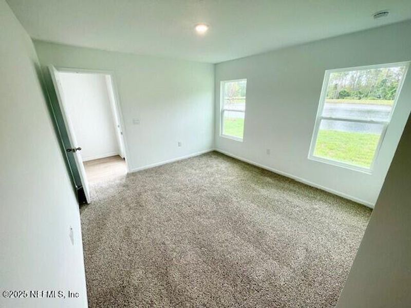 Spacious, unfurnished interior of a new home in Grand Reserve, Bunnell (Image 47).