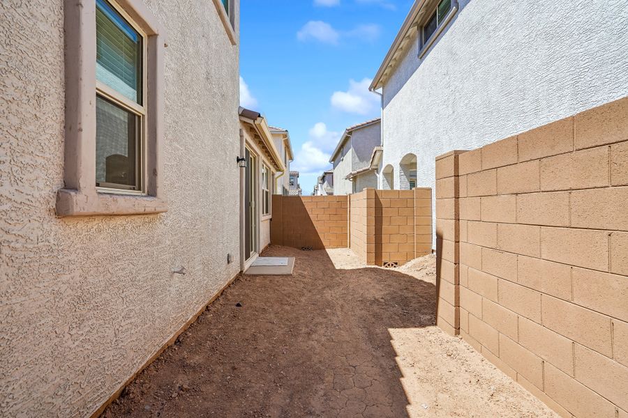 Exterior details and patio area of a home in Rancho Mercado, Surprise (Image 22).