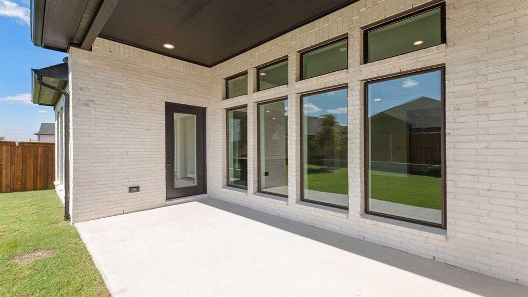 Exterior details and patio area of a home in Trinity Falls 60', McKinney (Image 18). Exterior details and patio area of a home in Trinity Falls 60', McKinney (Image 18).